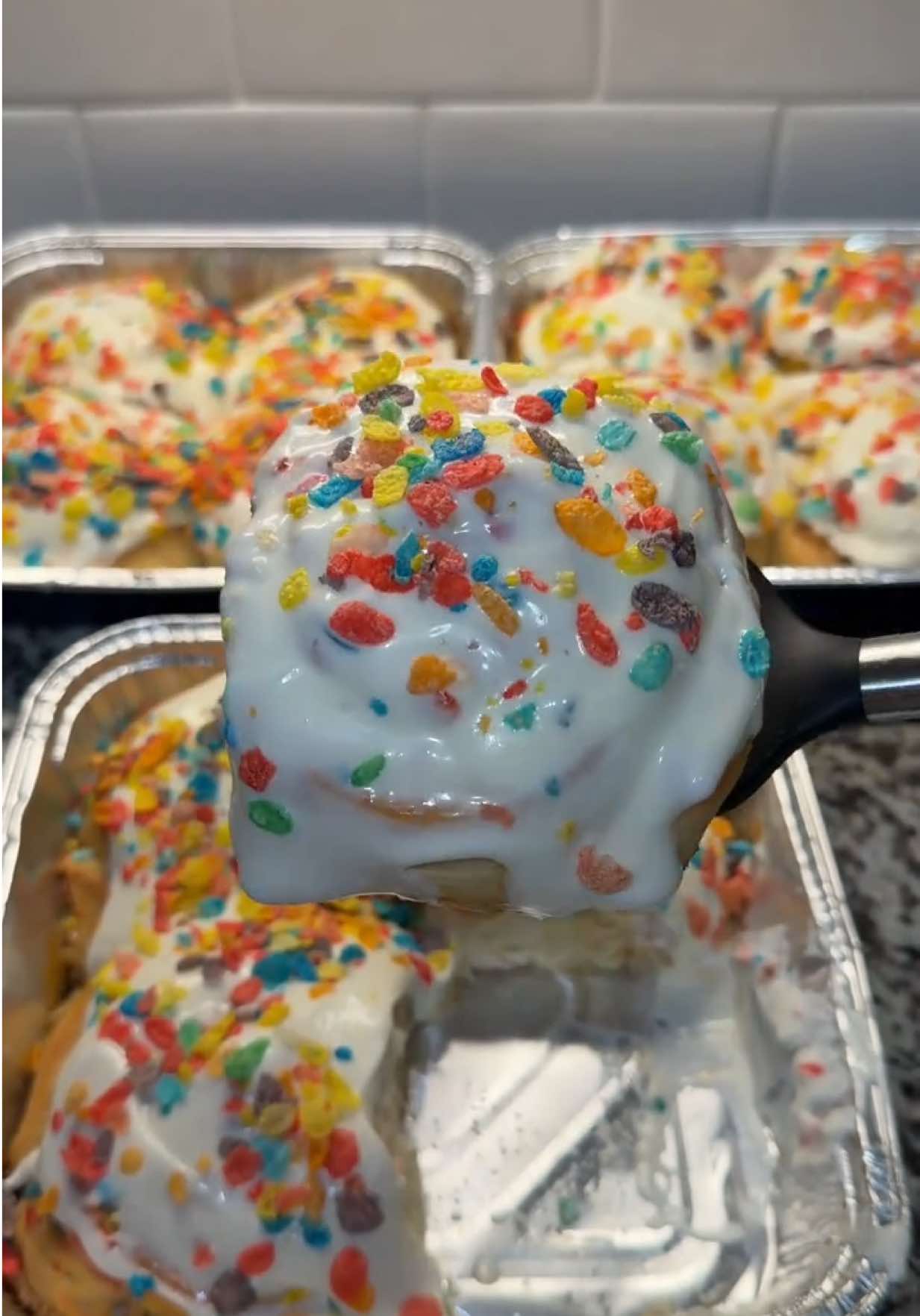 Fruity Pebble Cinnamon Rolls with Marshmallow Cream Cheese Icing